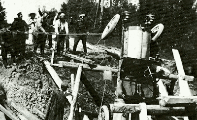 Recovering a car from a broken trestle bridge during the Peking to Paris
