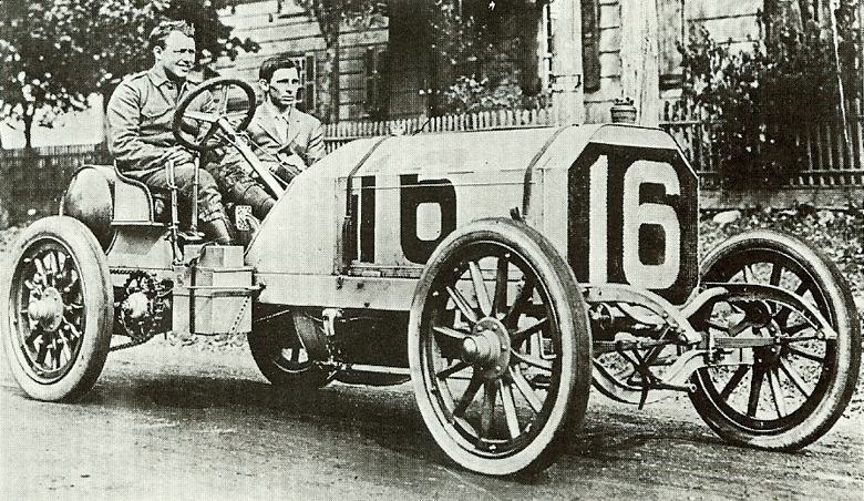 George Robertson poses at the wheel of his Locomobile prior to the start of the 1908 Vanderbilt Cup