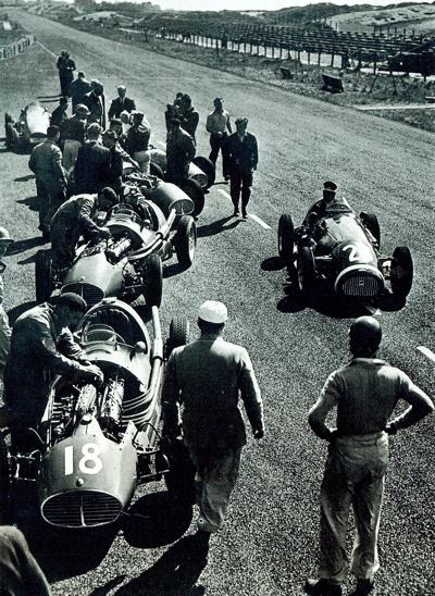 Line up at the pits during parctice for the 1953 Dutch Grand Prix at Zandvoort