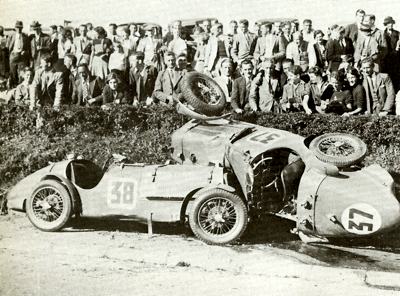 Two Singer 9s after a crash in the 1935 TT