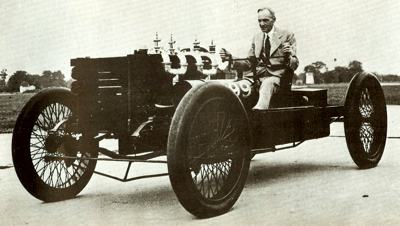 Henry Ford poses with the legendary 999 racer